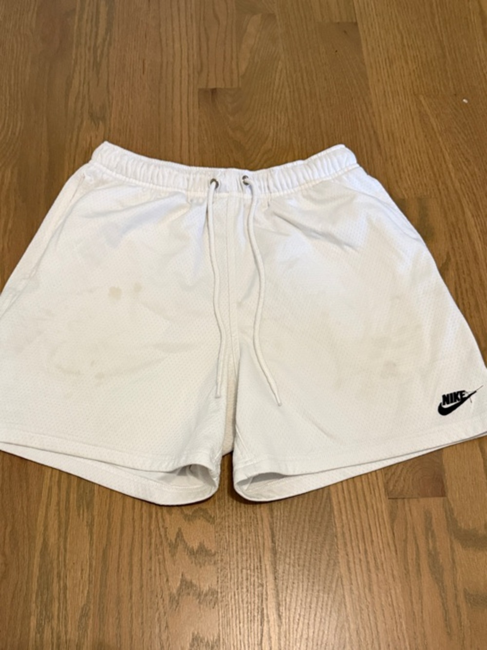 Nike White Men's Mesh Athletic Shorts with Black Swoosh